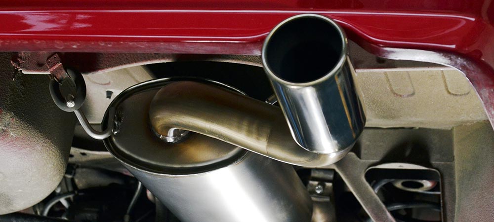 close view of car muffler and exhaust system